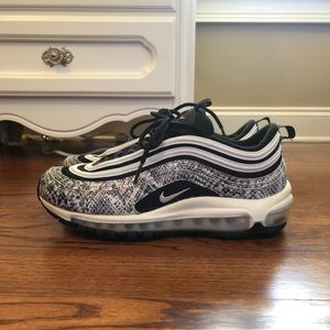women black and white nike 97